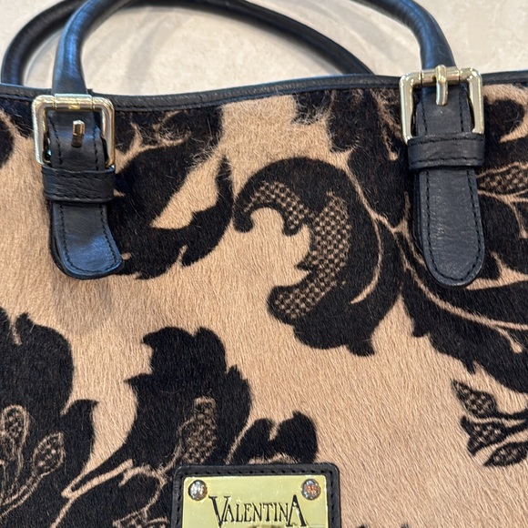 Valentina cowhide fur tote that measures approximately 18“ x 11“ x 5 1/2“ - Picture 6 of 8
